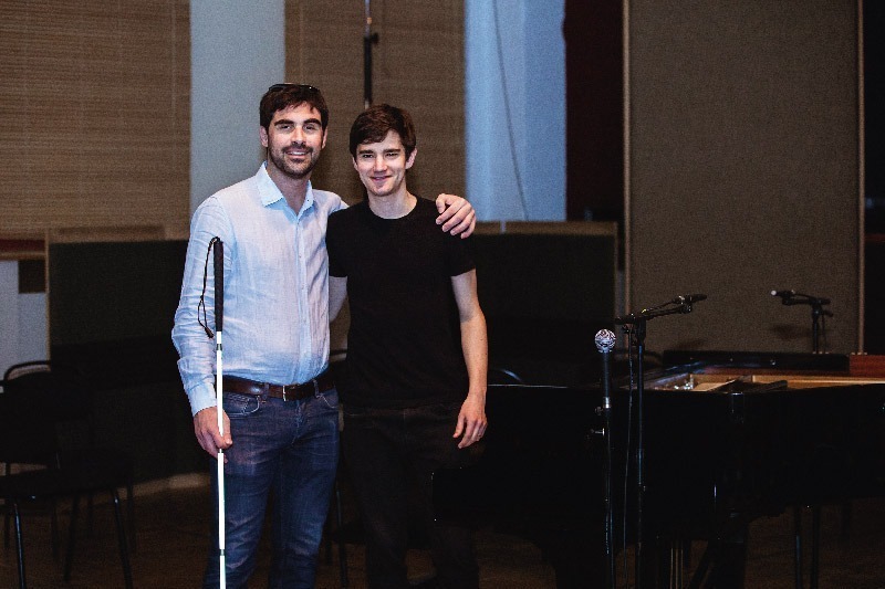 Karl Meesters and Bram De Looze next to the grand piano